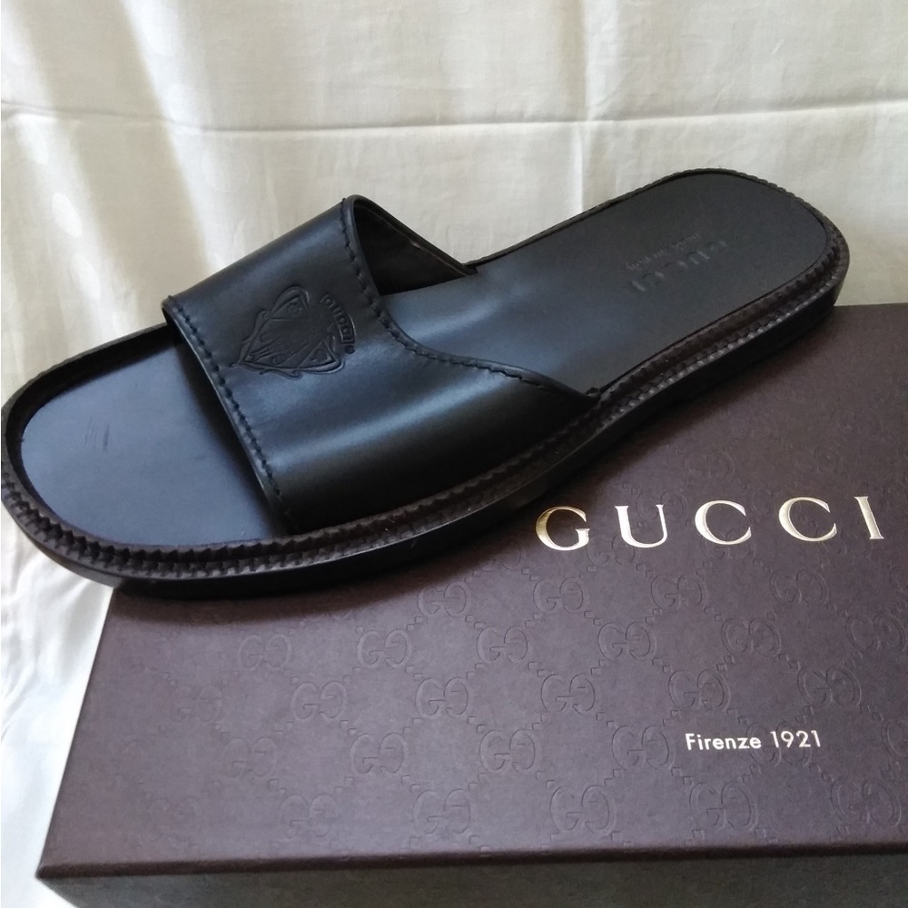 Gucci mens leader slides with gucci logo. Dark brown soles. Brand new.s Size 11